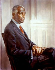 Painted portrait of Dr. Benjamin E. Mays, seated in a dark suit with a red tie, hands resting before him